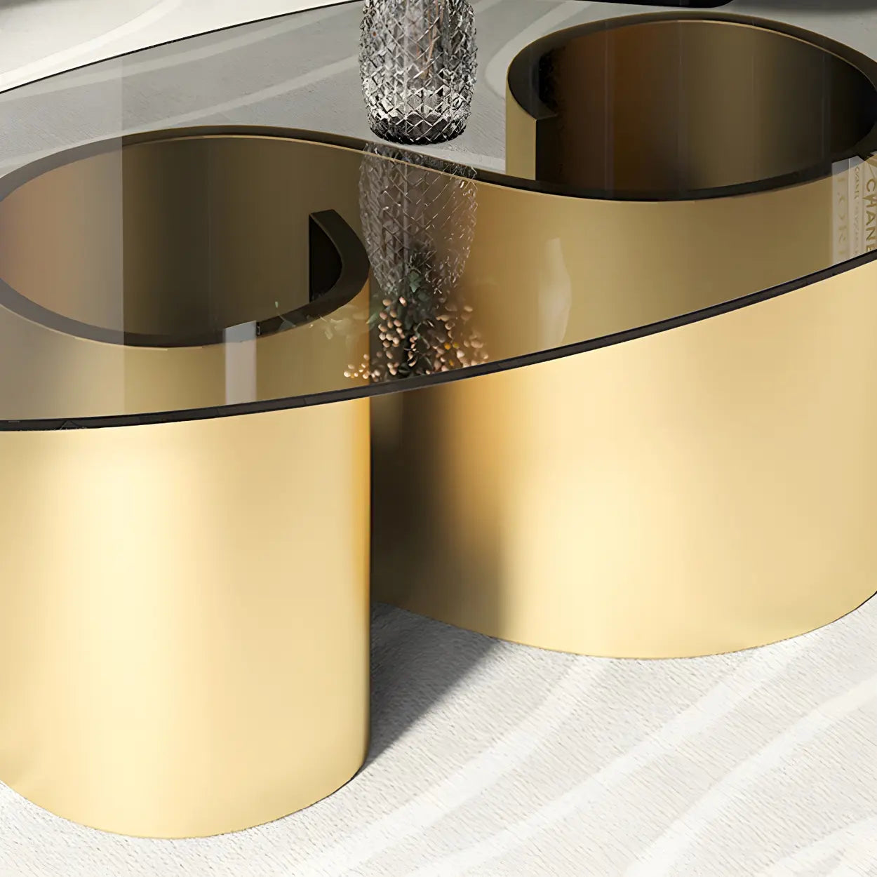 Oval Coffee Table with Abstract Metal Base — Black / Brown