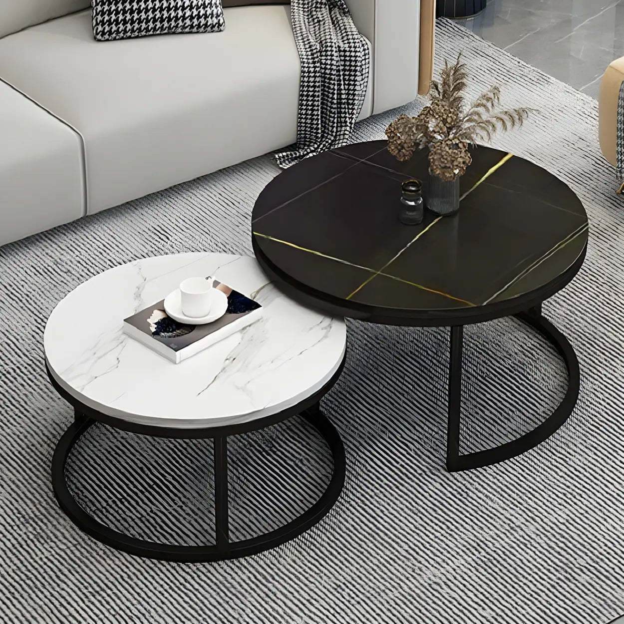 Gray modern nesting metal-frame coffee tables — 24" Dia x 18" H & 18" Dia x 16" H / Black & White / Black