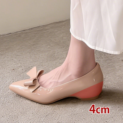 リボンモチーフ エナメルパンプス