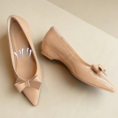 リボンモチーフ エナメルパンプス