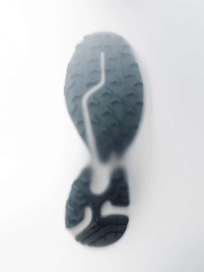 Salomon performance shoe outsole in soft focus
