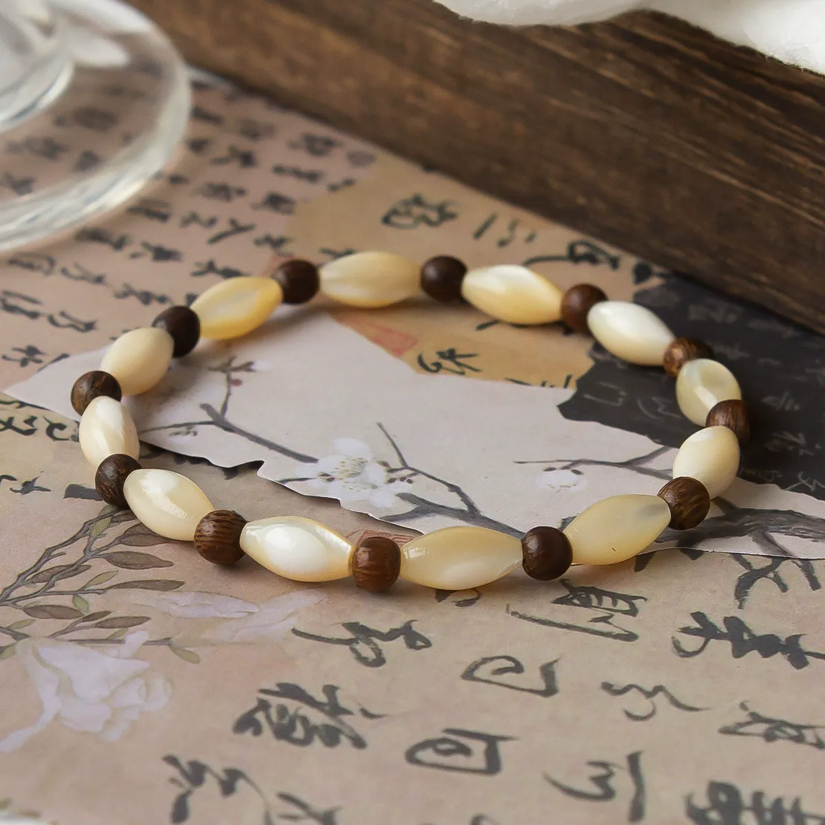 Artisanal Shell and Wooden Bead Bracelet-attracting good fortune, warding off negativity, and fostering harmony