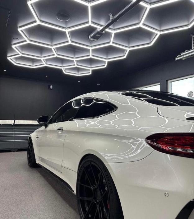 Even lighting hexagon LED light in clean garage interior