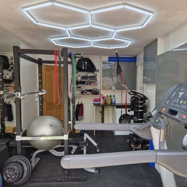 Even light hexagon LED system for modern home gym interior
