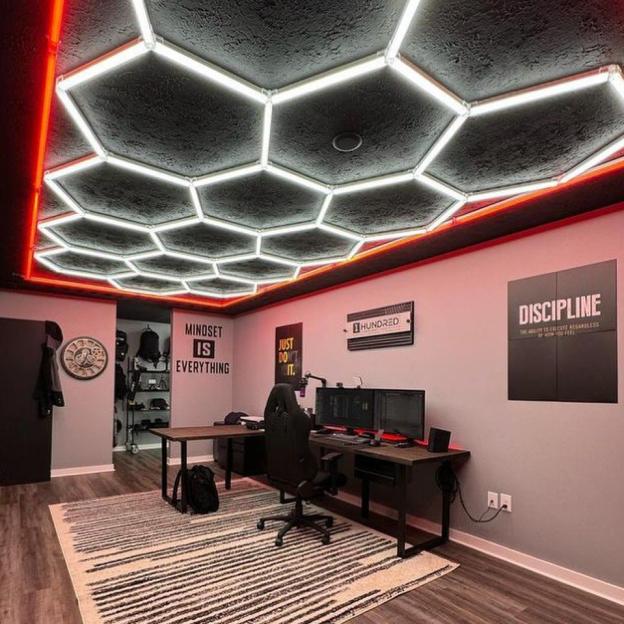 Red bordered hexagon LED light creating bold atmosphere in mancave