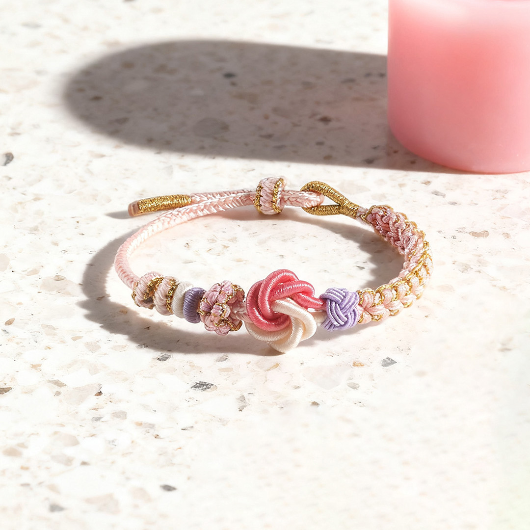 Mi Nieta - Pulsera Nudo de Flores en Rosa y Blanco
