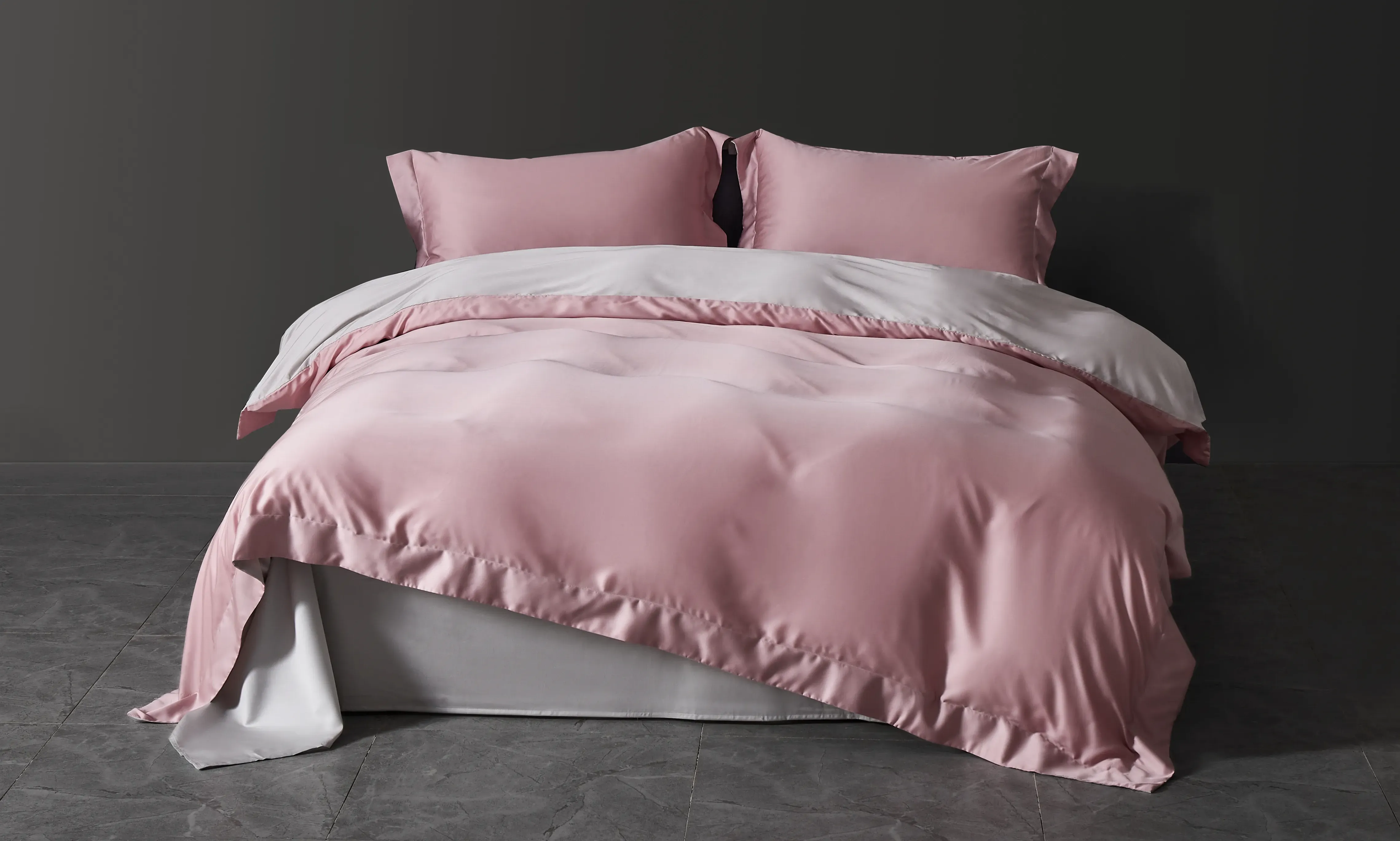 Tencel Lyocell bedding set in dusty pink with a reversible grey duvet cover and pillowcases