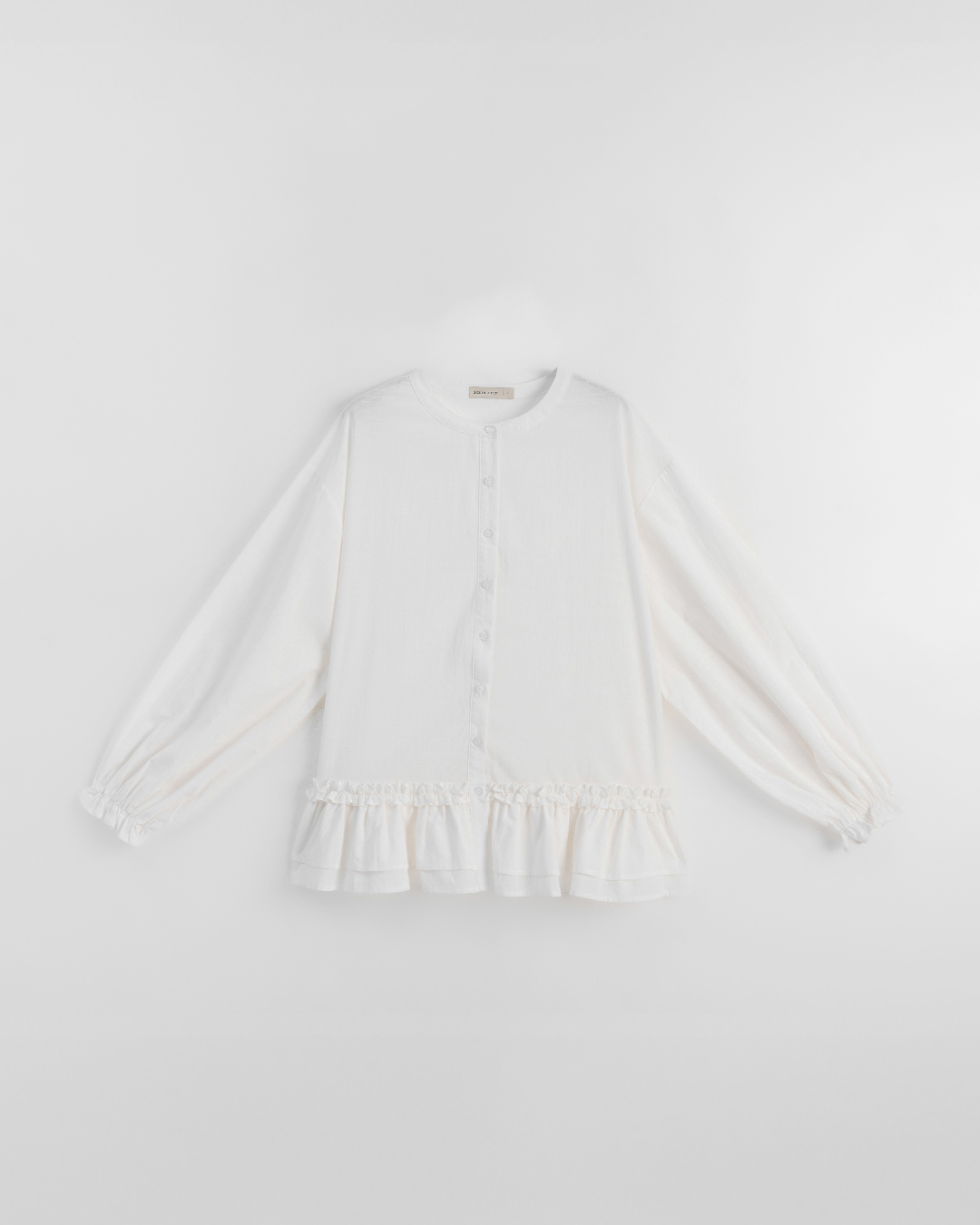 フリル裾ラウンドネックシャツ 2色展開