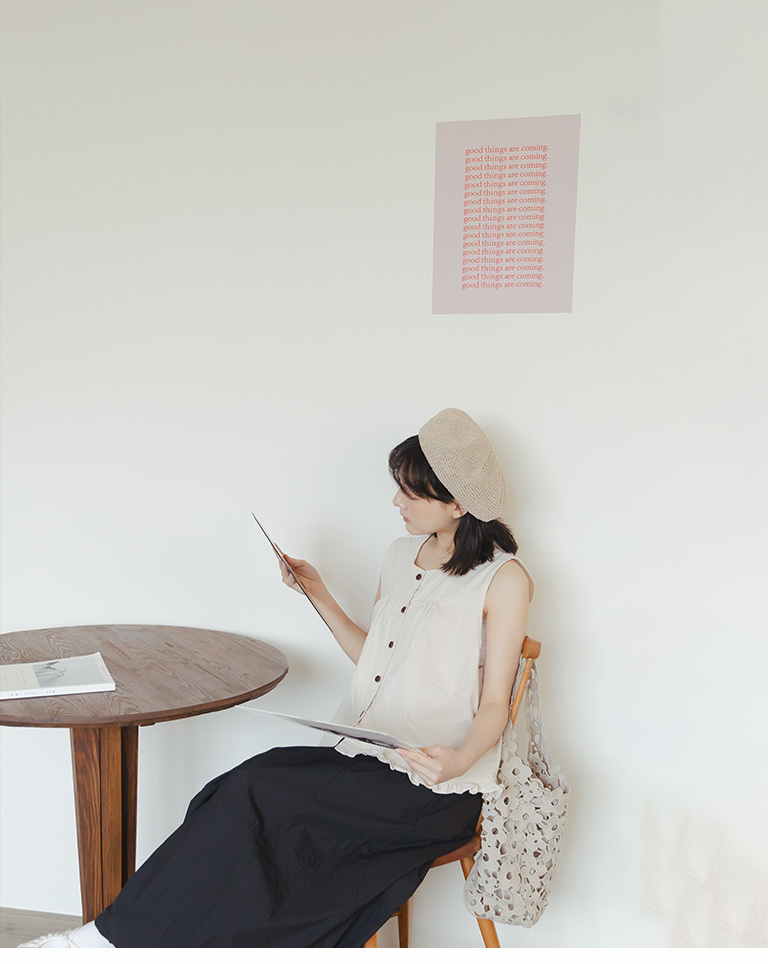 裾フリルボタンベスト