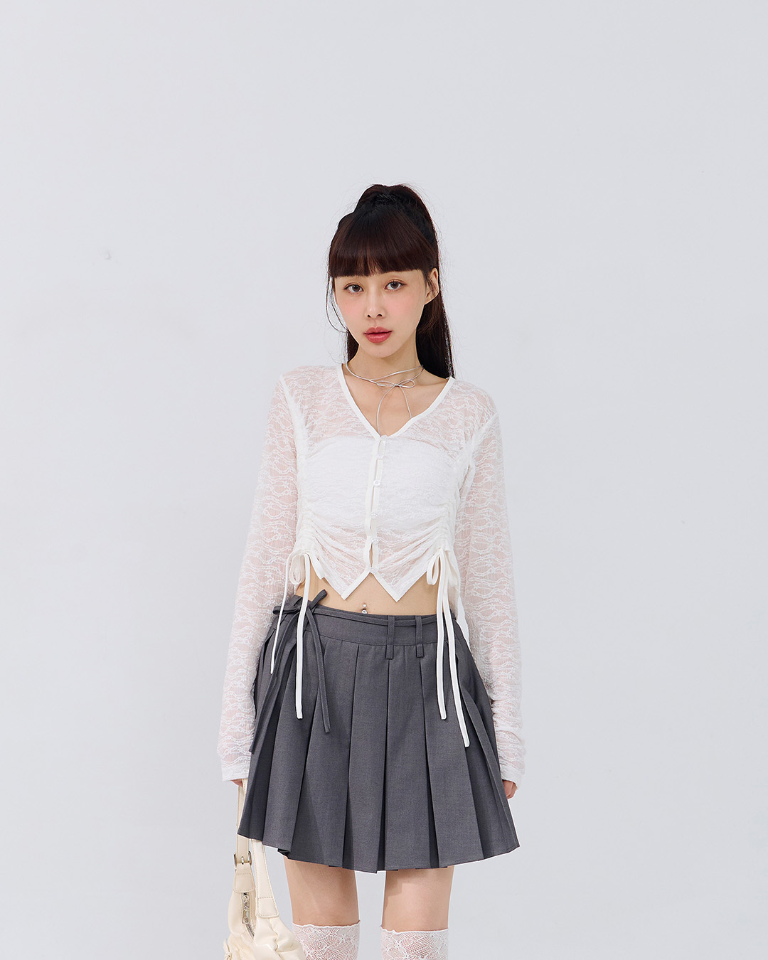 透かし編みクロップドドロストトップス 2色展開