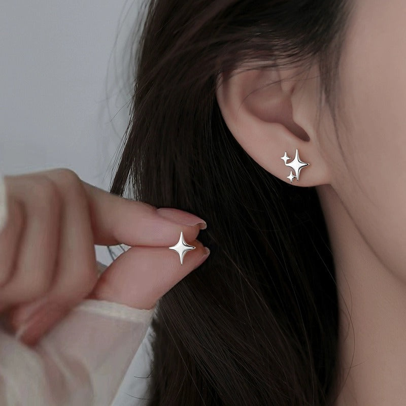 925 sterling silver asymmetrical star earrings - silvery