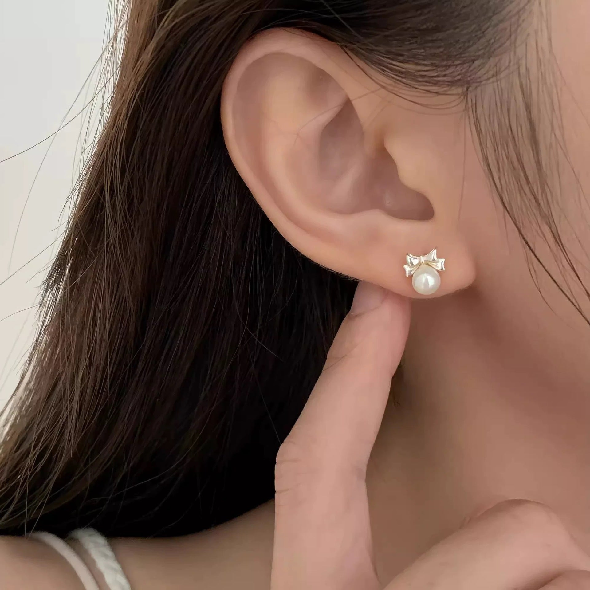 999 silver bowknot pearl earrings - silvery