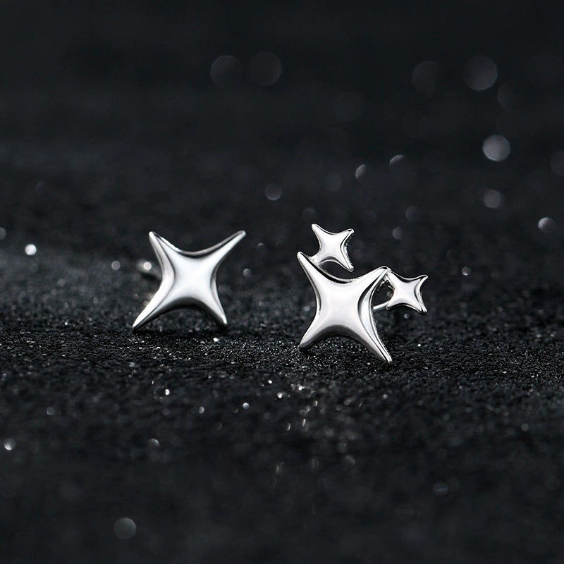925 sterling silver asymmetrical star earrings - silvery