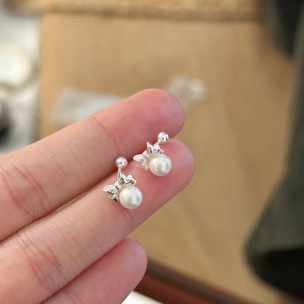 999 silver bowknot pearl earrings - silvery