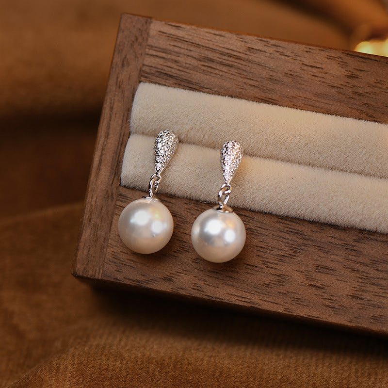 Imitation pearl earrings - silver