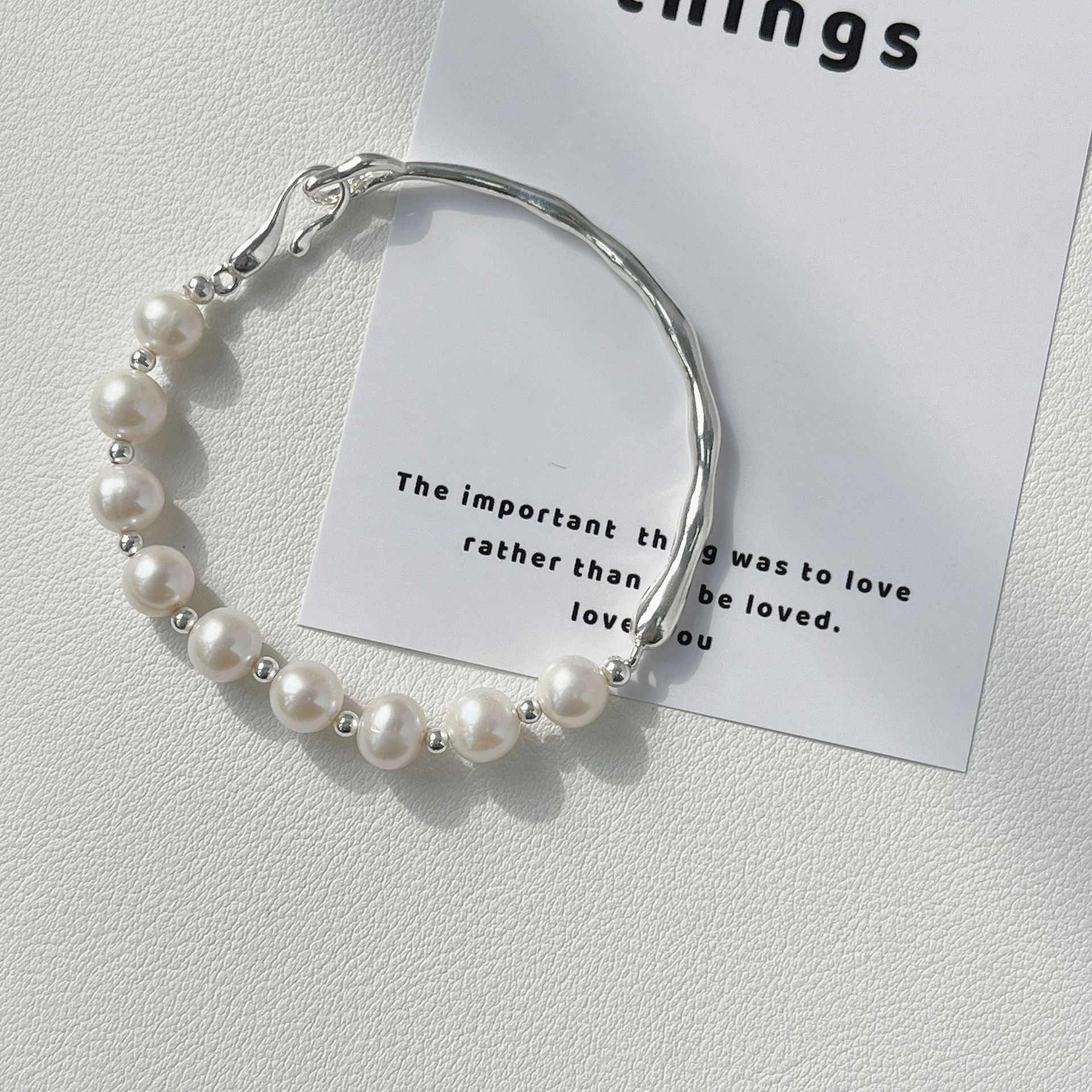 925 sterling silver asymmetrical pearl bracelet - silvery