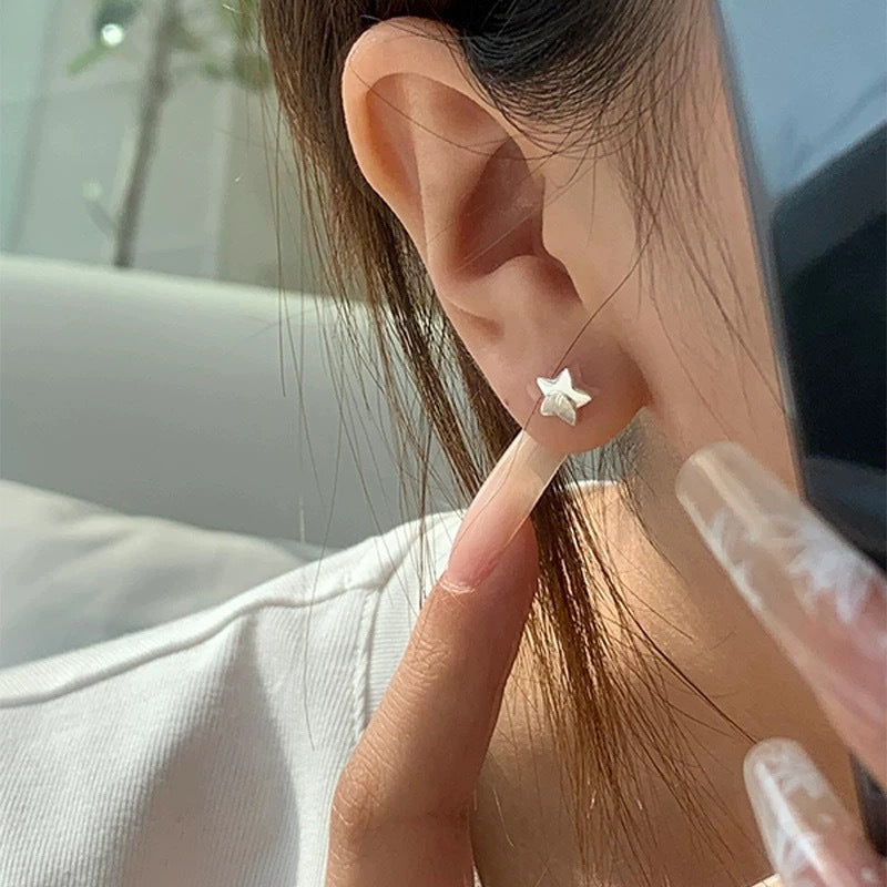 925 sterling silver star shaped earrings - silvery