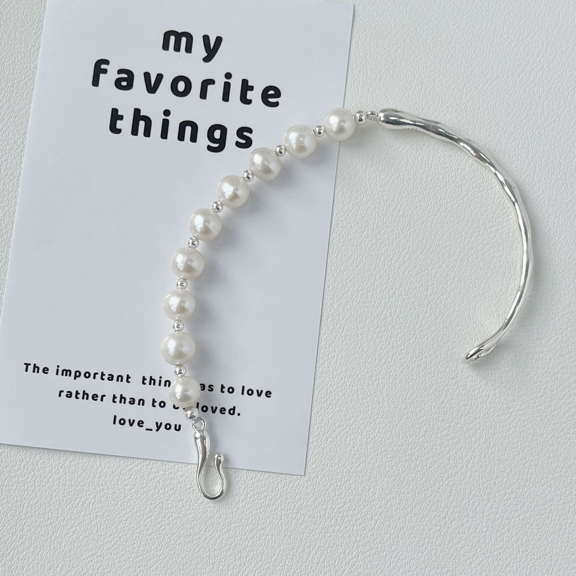 925 sterling silver asymmetrical pearl bracelet - silvery