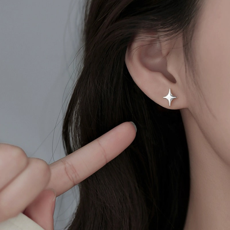 925 sterling silver asymmetrical star earrings - silvery