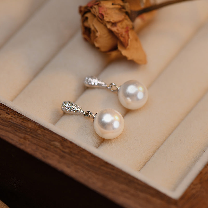 Imitation pearl earrings - silver