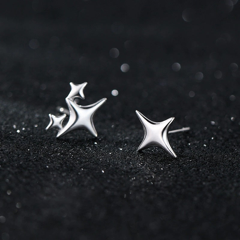 925 sterling silver asymmetrical star earrings - silvery
