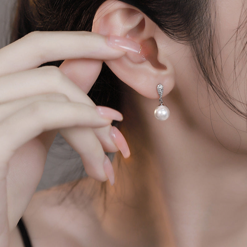 Imitation pearl earrings - silver