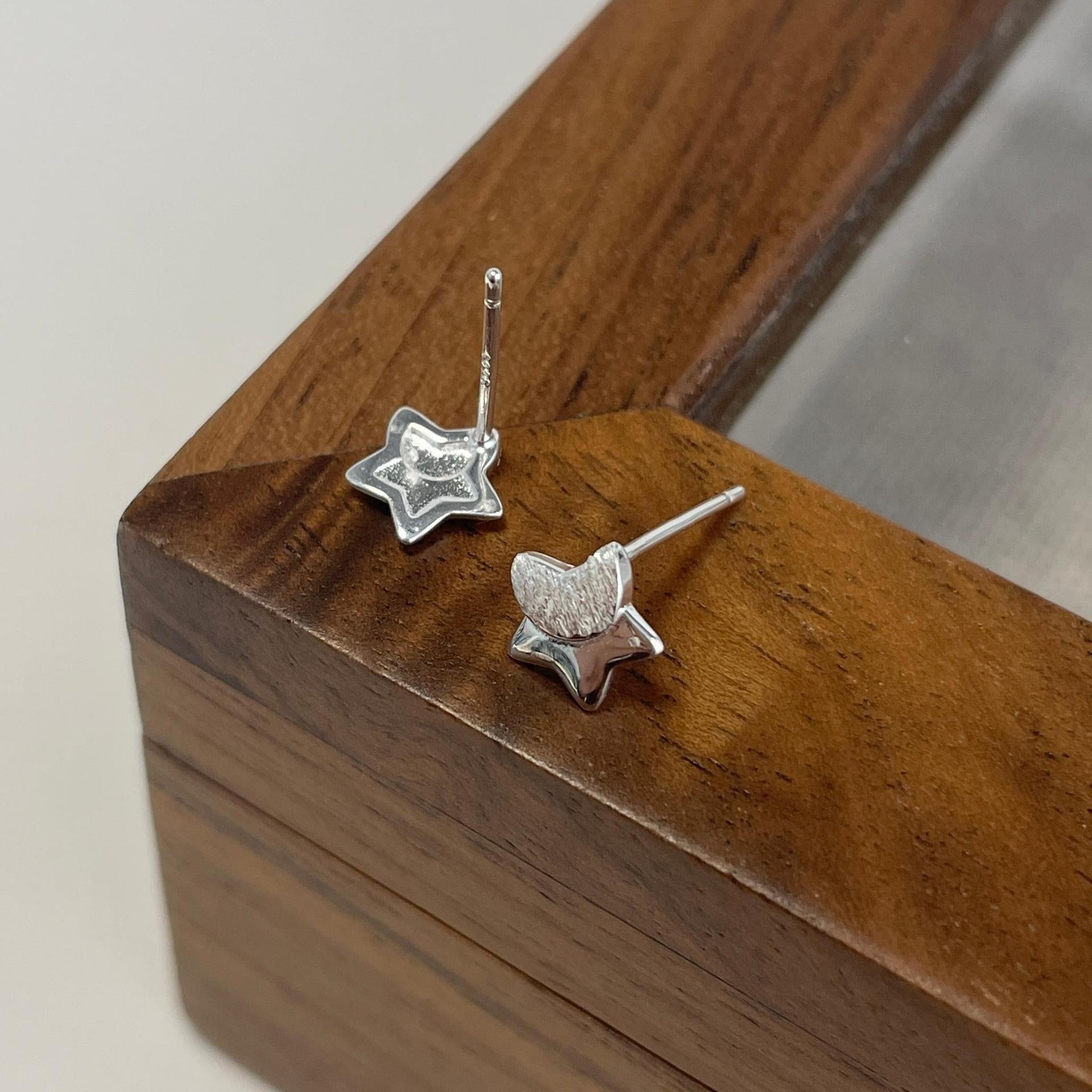 925 sterling silver star shaped earrings - silvery