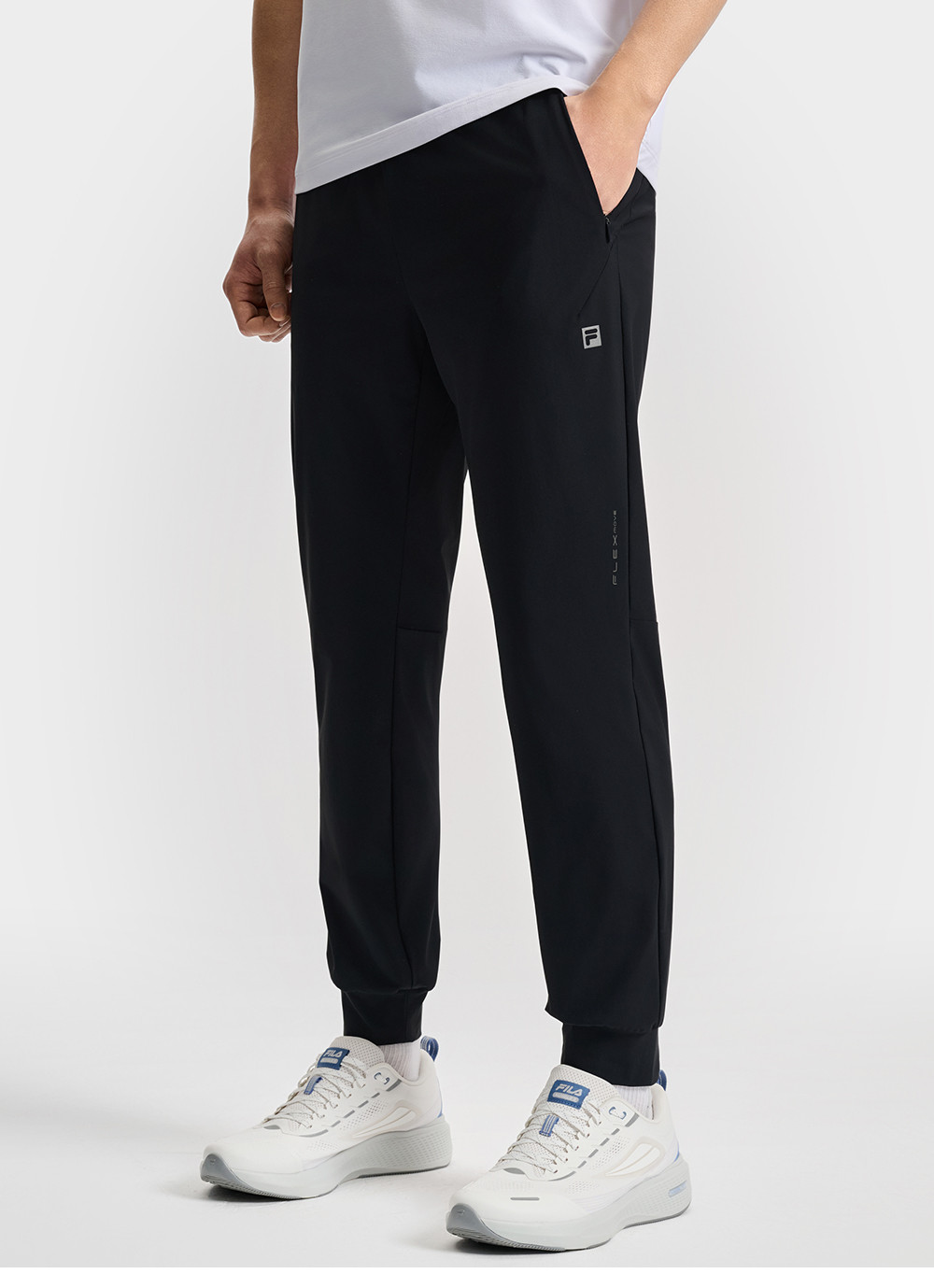 FILA CORE ATHLETICS FITNESS MEN ARTE ELEGANTE Men Knit Pants (Black)
