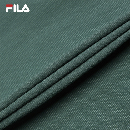 FILA CORE WHITE LINE BLUE Men Woven Top in Green