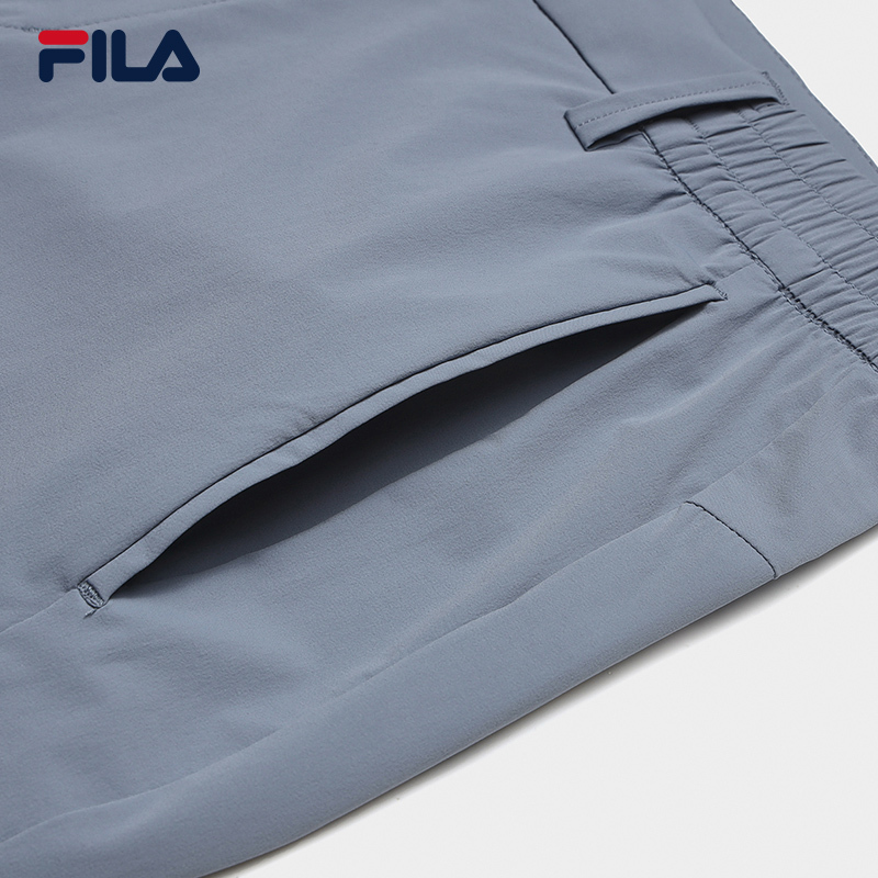 FILA CORE LIFESTYLE WHITE LINE ESCAPE THE CITY Men Woven Pants