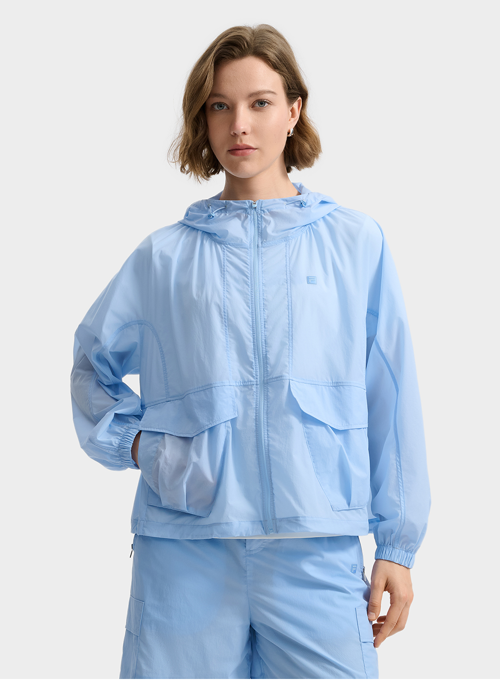 FILA CORE LIFESTYLE WHITE LINE ESCAPE THE CITY Women Sun-proof Jacket (Light Blue)