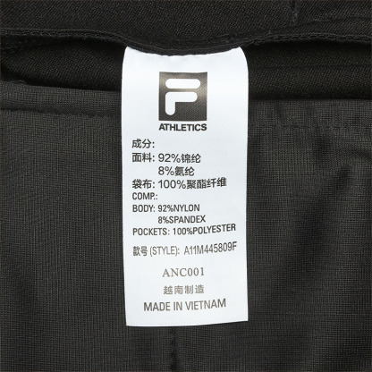 FILA CORE ATHLETICS GOLF X VERSAILLES COLLECTION Men Woven Pants (Black)