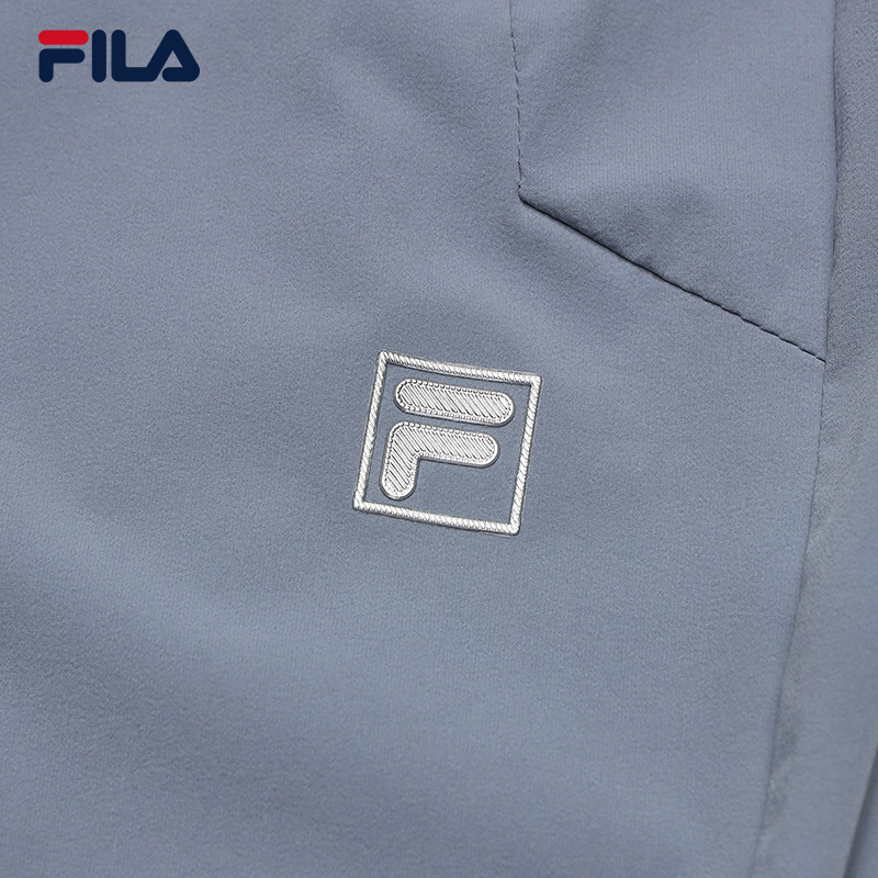 FILA CORE LIFESTYLE WHITE LINE ESCAPE THE CITY Men Woven Pants