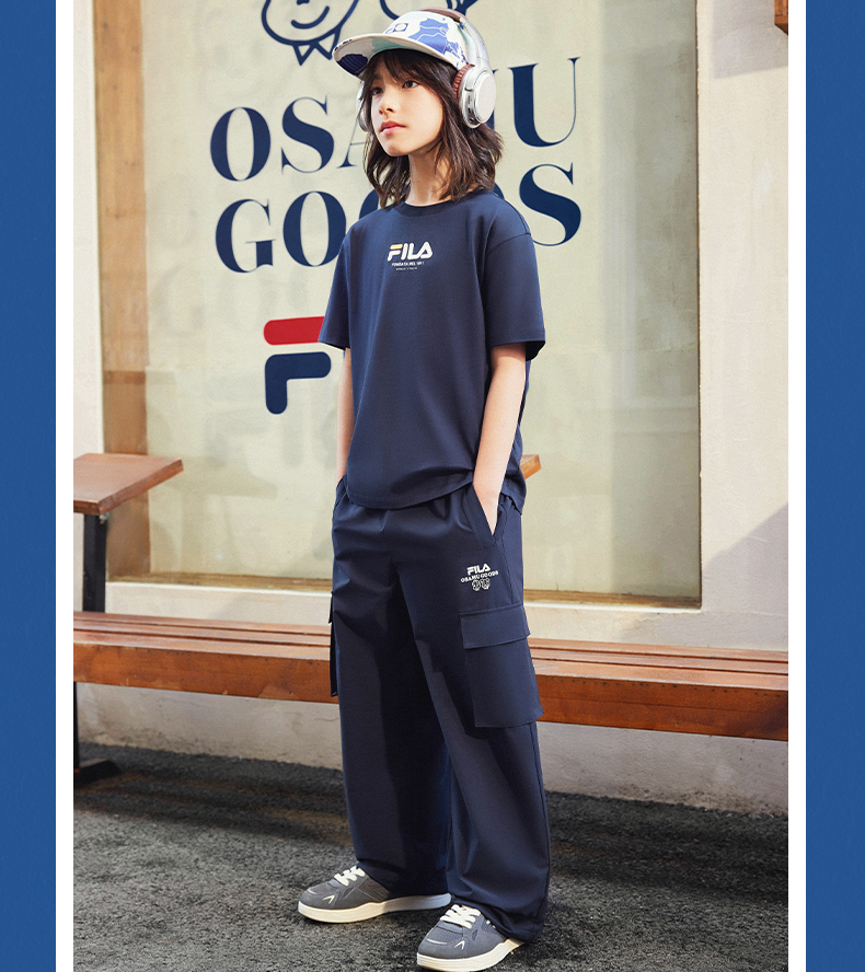 (130 - 170cm) FILA KIDS x OSAMU GOODS Boys Short Sleeve T-Shirt in White/Navy/Turquoise