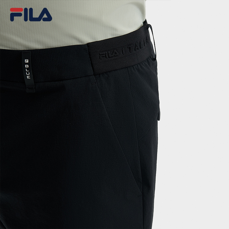 FILA CORE WHITE LINE BLUE Men Woven Pants in Black