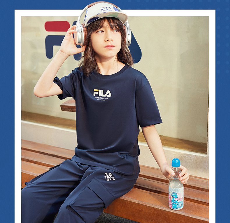 (130 - 170cm) FILA KIDS x OSAMU GOODS Boys Short Sleeve T-Shirt in White/Navy/Turquoise