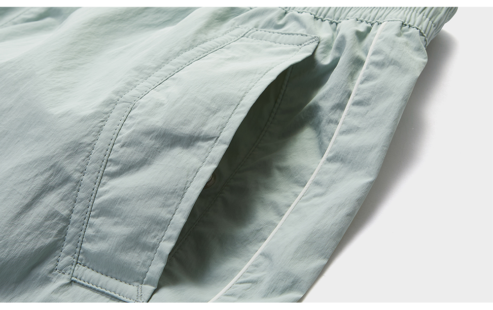 FILA FUSION INLINE FUSION LIFE FUSIONEER IVORY OASIS Women Woven Pants (Light Green)