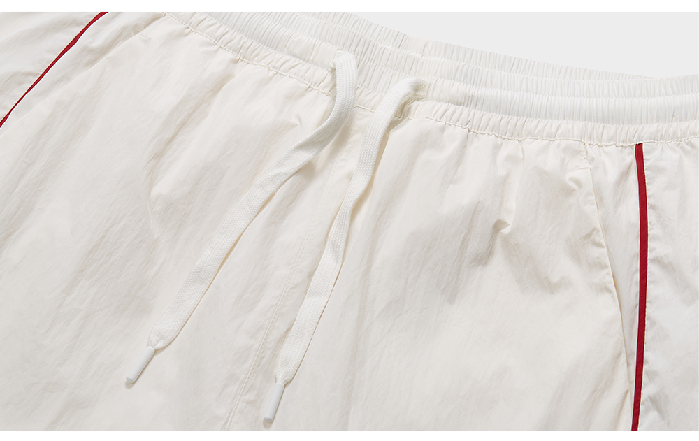 FILA FUSION Women's INLINE Culture Woven Pants in White
