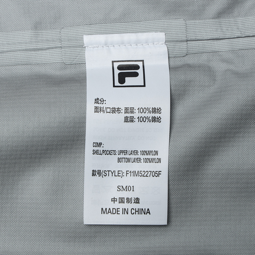 FILA CORE LIFESTYLE BLUE CONTEMPORARY OASIS Men Woven Jacket (Black / Grey)