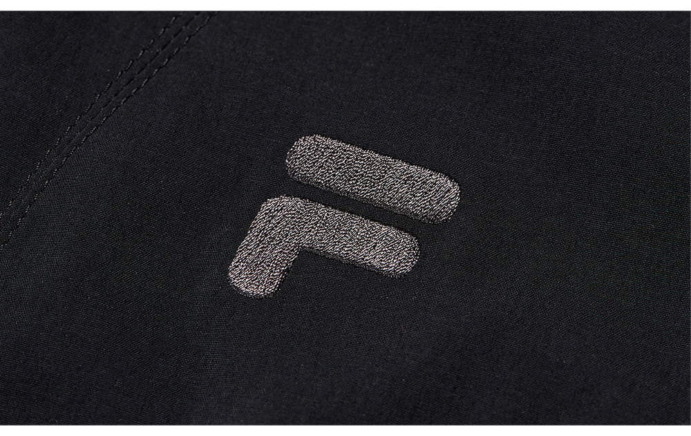 FILA FUSION INLINE X WORKWEAR STREET DOLPHIN Women Woven Top (Black)