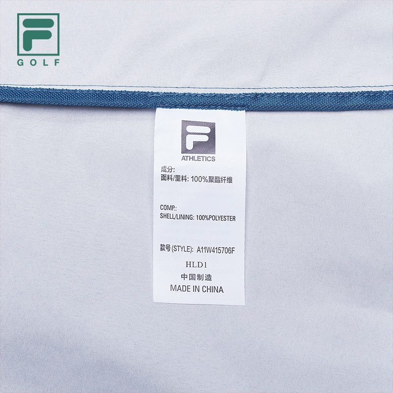 FILA CORE ATHLETICS GOLF Womens Woven Top in Blue