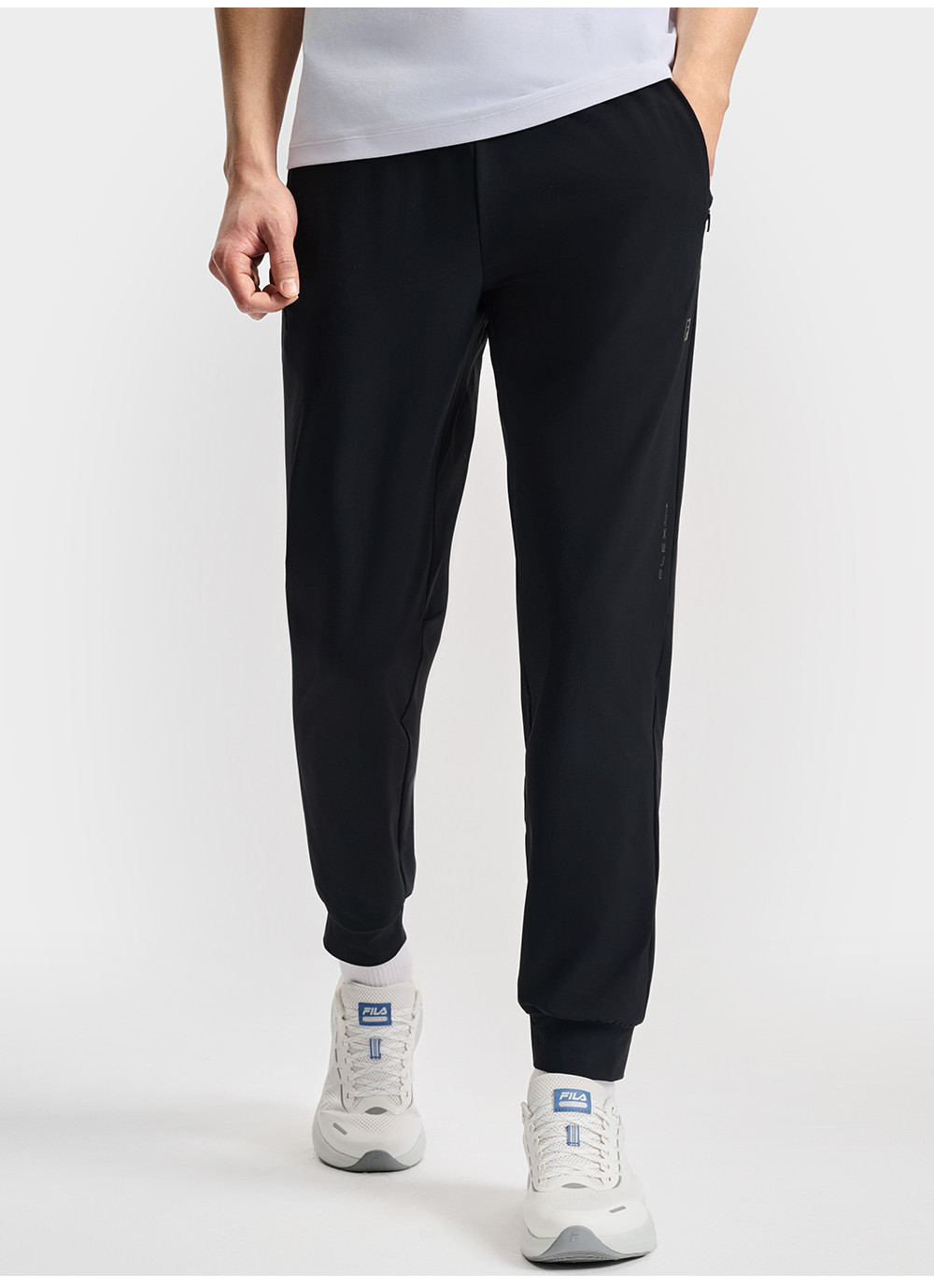 FILA CORE ATHLETICS FITNESS MEN ARTE ELEGANTE Men Knit Pants (Black)