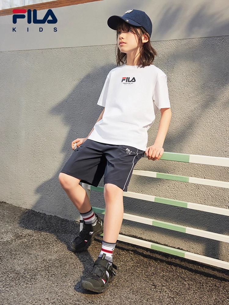 (130 - 170cm) FILA KIDS x OSAMU GOODS Boys Short Sleeve T-Shirt in White/Navy/Turquoise