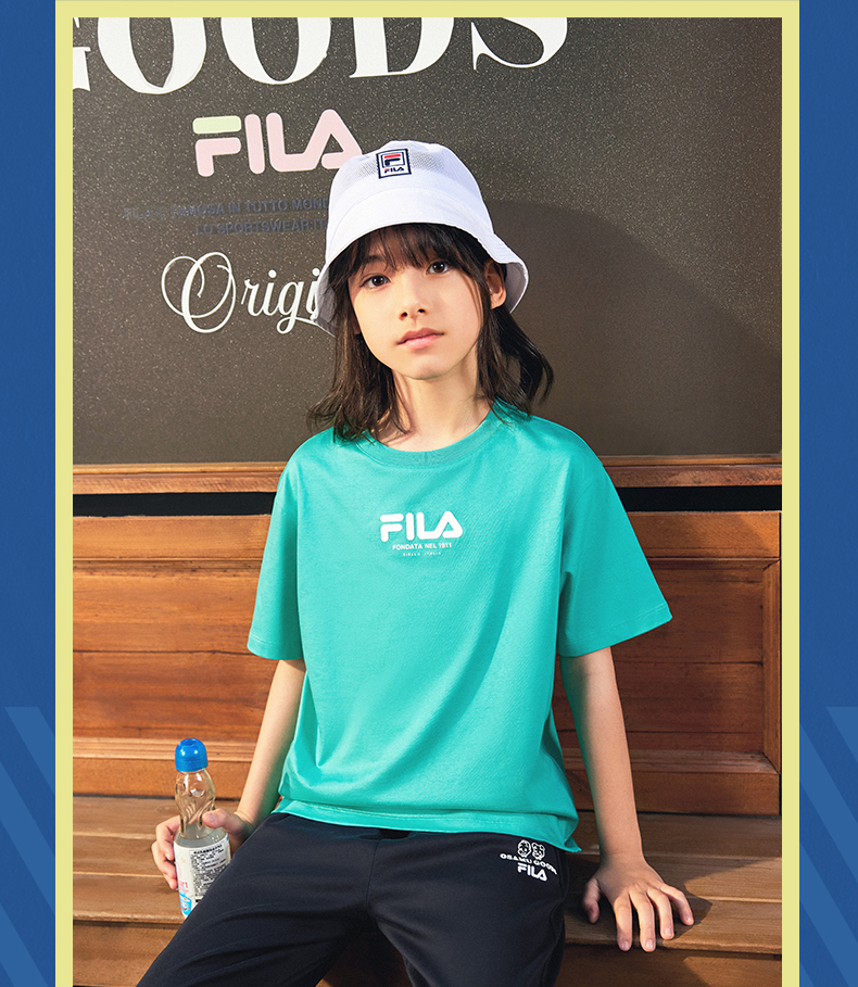(130 - 170cm) FILA KIDS x OSAMU GOODS Boys Short Sleeve T-Shirt in White/Navy/Turquoise