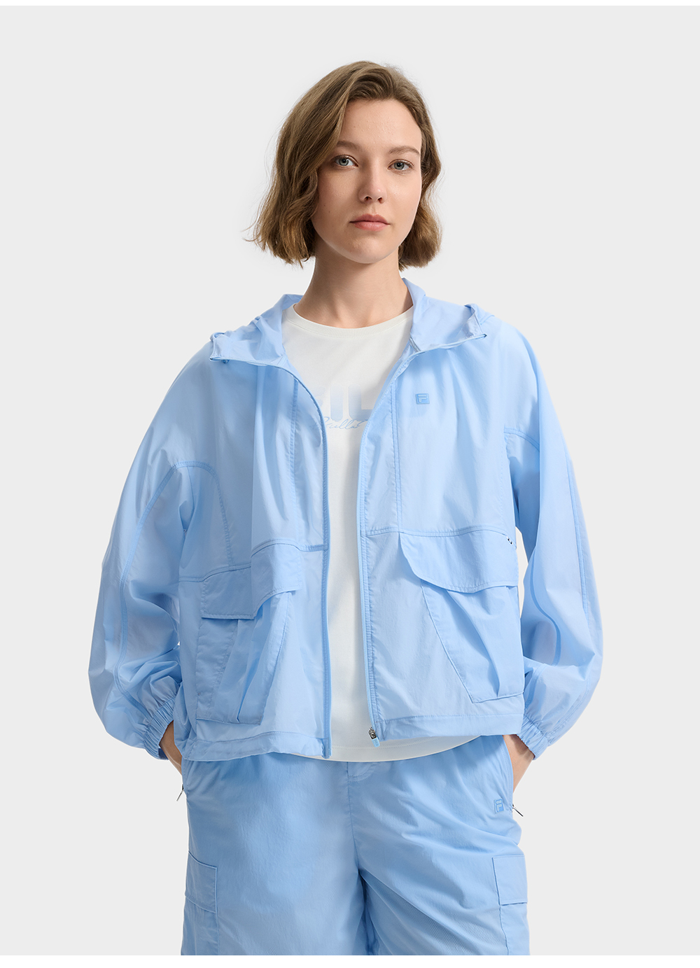 FILA CORE LIFESTYLE WHITE LINE ESCAPE THE CITY Women Sun-proof Jacket (Light Blue)