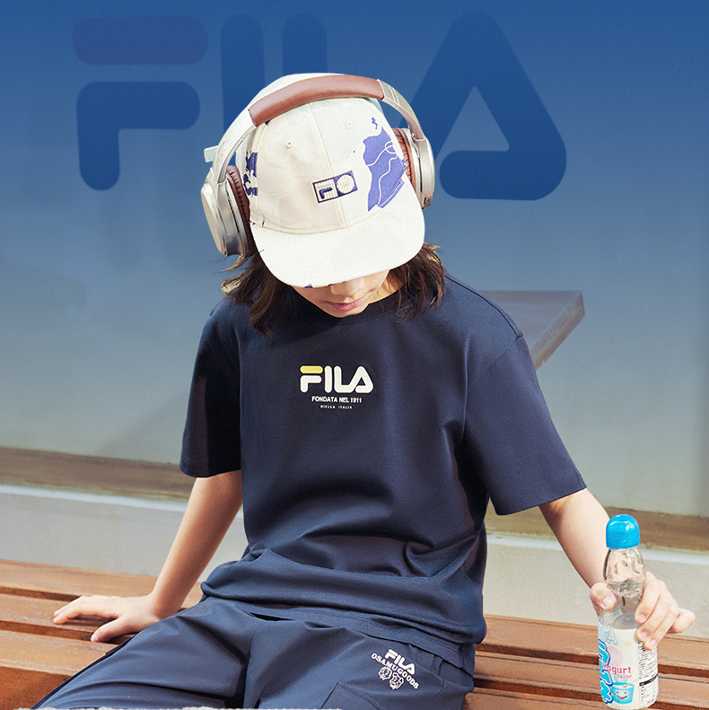 (130 - 170cm) FILA KIDS x OSAMU GOODS Boys Short Sleeve T-Shirt in White/Navy/Turquoise