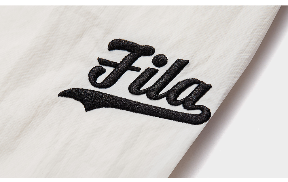 FILA FUSION Women's INLINE Culture Woven Pants in White