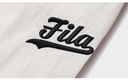 FILA FUSION Women's INLINE Culture Woven Pants in White