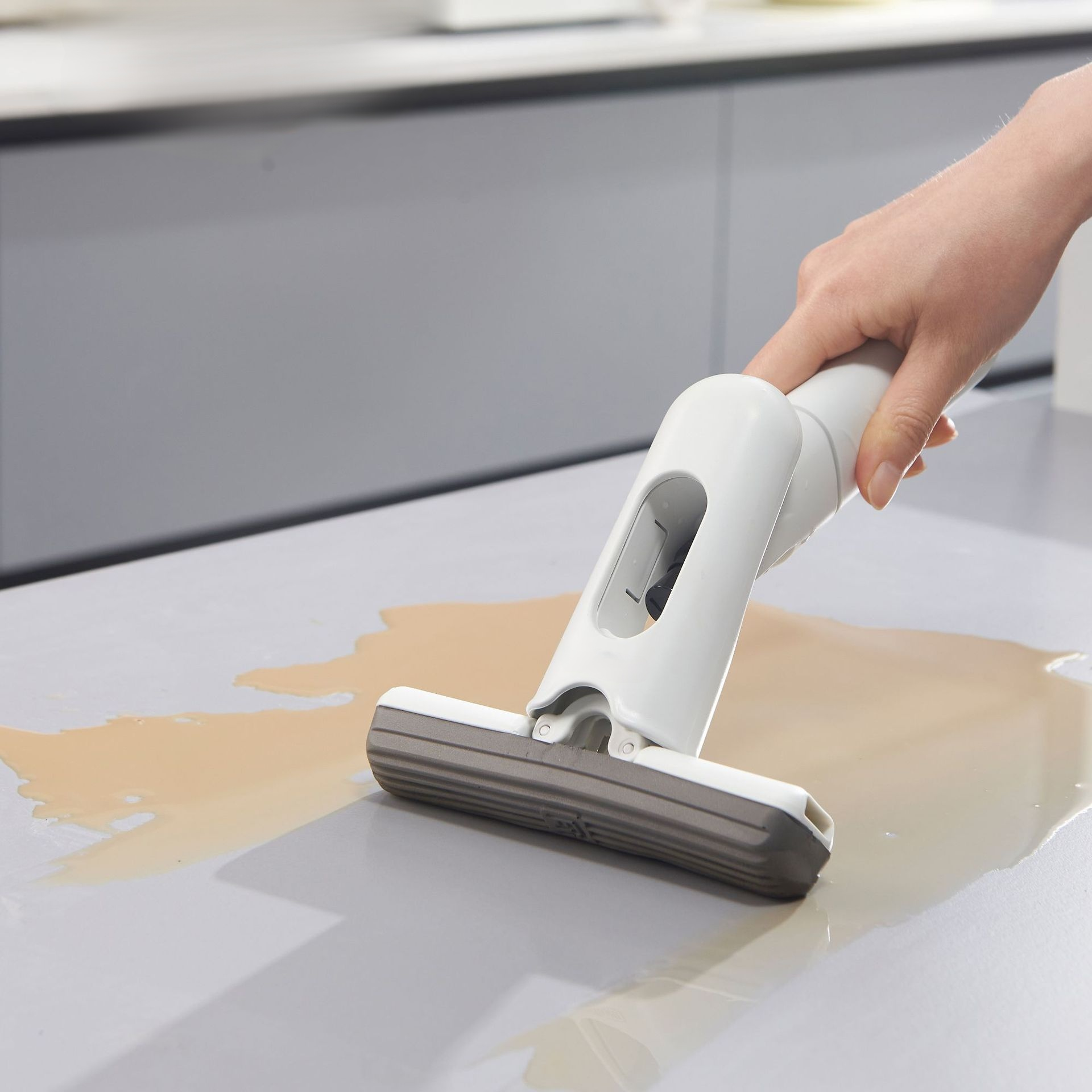 Handheld water spray mop for easy table wiping without hands washing