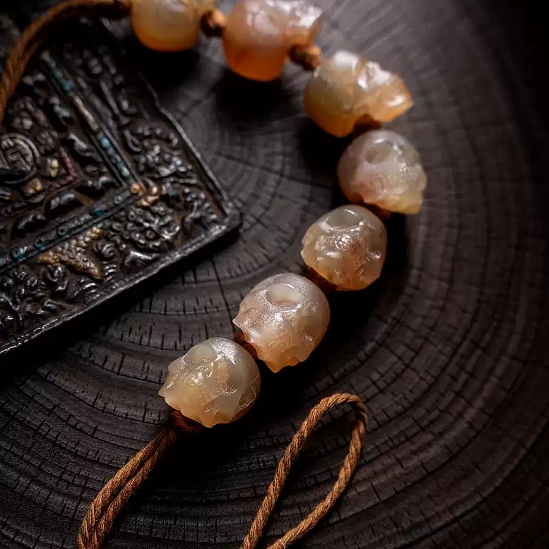 Shitro Lord Bone Bracelet: Tibetan Handcarved Goat Horn Mala with Yak Bone Skull Accents